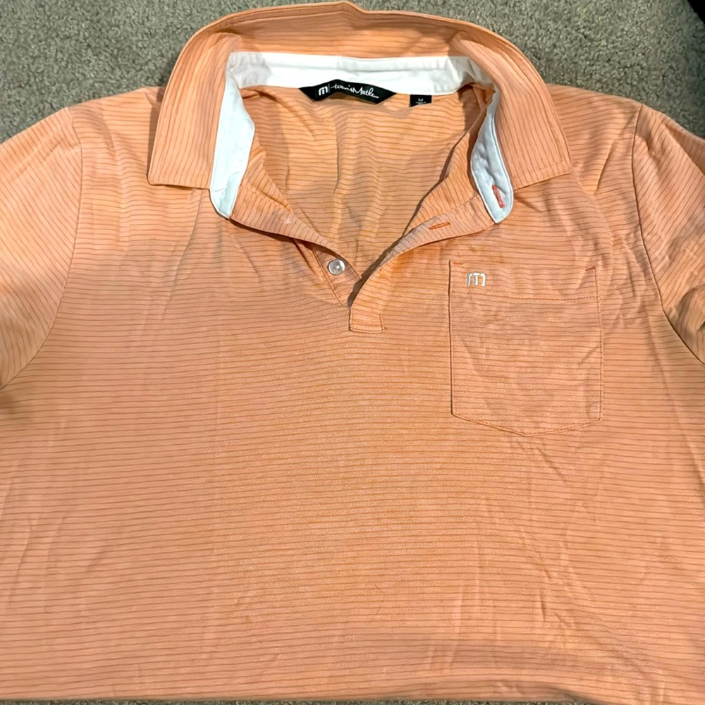Travis Matthew orange golf polo